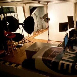 Photography studio lit up with lighting